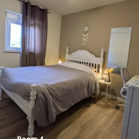 Quarto em Acomodações Particulares We Host Costa da Caparica